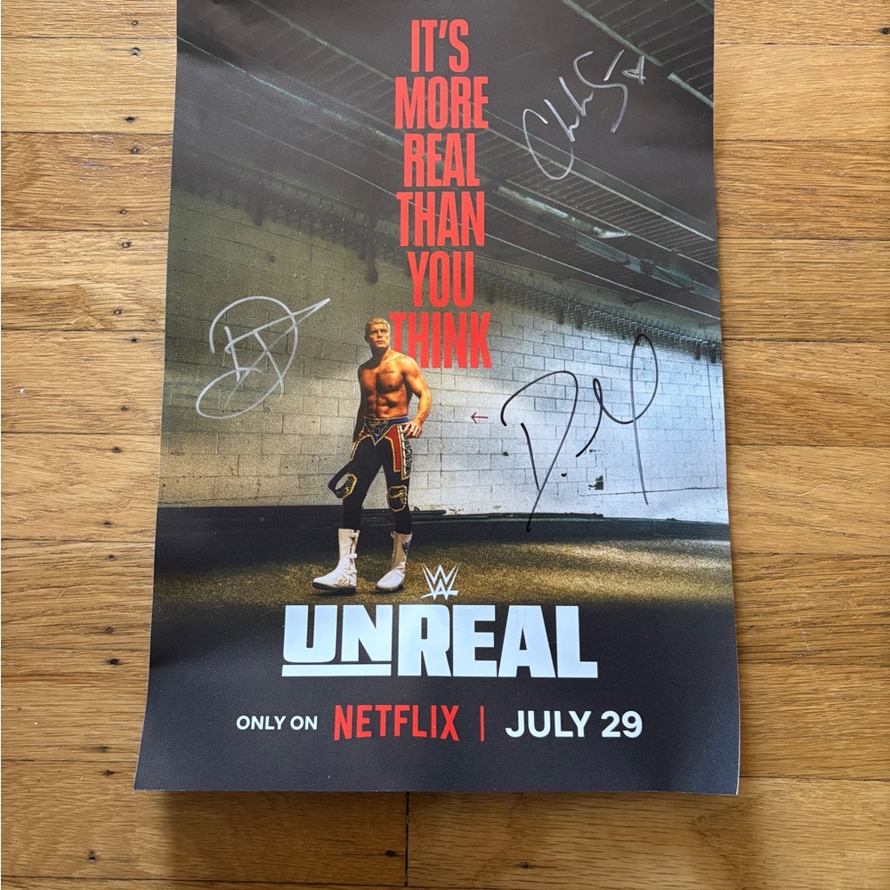 WWE UNREAL Autographed poster